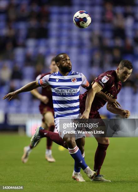 Junior Hoilett of Reading battles for possession with Kenny McLean of Norwich City during the Sky Bet Championship between Reading and Norwich City...