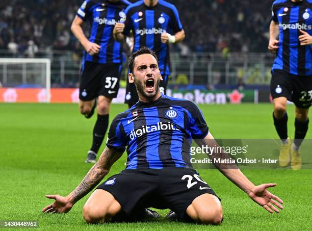 Hakan Calhanoglu of FC Internazionale celebrates after scoring the first goal of his team during the UEFA Champions League group C match between FC...