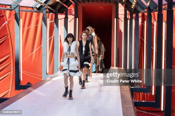 HoYeon Jung and models walk the runway during the Louis Vuitton Womenswear Spring/Summer 2023 show as part of Paris Fashion Week on October 04, 2022...