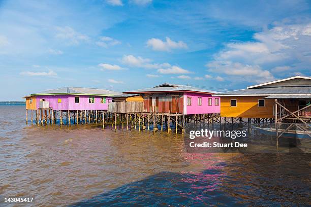 houses on stilts, sandakan - stilt stock pictures, royalty-free photos & images