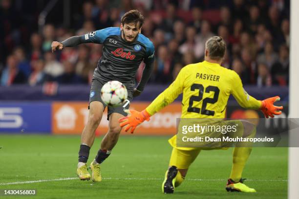 Khvicha Kvaratskhelia of SSC Napoli scores their team's fifth goal past Remko Pasveer of Ajax during the UEFA Champions League group A match between...