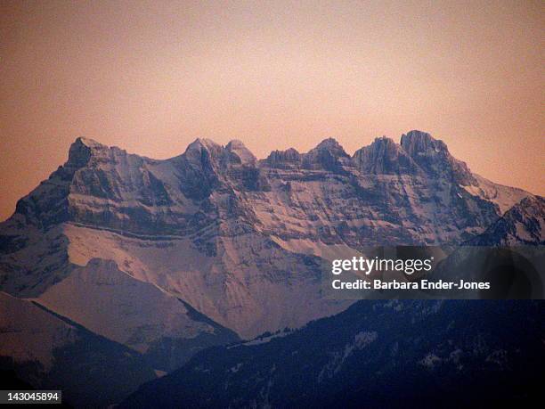 dents du midi at dusk - dents du midi stockfoto's en -beelden