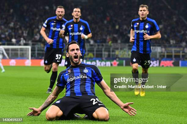 Hakan Calhanoglu of FC Internazionale celebrates after scoring the goal during the UEFA Champions League group C match between FC Internazionale and...