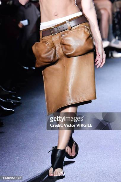 Model walks the runway during the Miu Miu Ready to Wear Spring/Summer 2023 fashion show as part of the Paris Fashion Week on October 4, 2022 in...