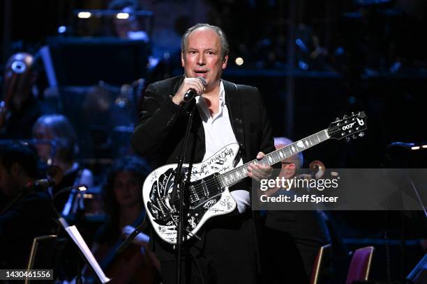 Hans Zimmer performs on stage accompanied by The Royal Philharmonic Concert Orchestra during The Sound of 007 in concert at The Royal Albert Hall on...