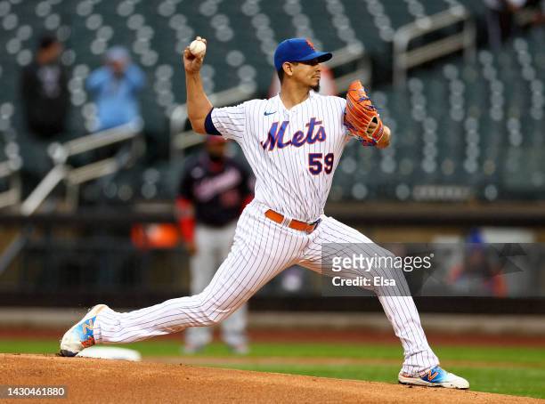 Carlos Carrasco of the New York Mets delivers a pitch in the first inning against the Washington Nationals during game one of a double header at Citi...