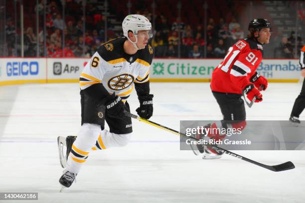 Boston Bruins defenseman Mike Reilly skates against the New Jersey Devils on October 3, 2022 at the Prudential Center in Newark, New Jersey.