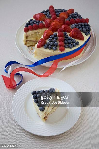 union jack cake with slice taken out - union jack ribbon stock pictures, royalty-free photos & images