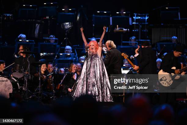 Members of Garbage, Steve Marker, Shirley Manson, Duke Erikson and Butch Vig perform on stage accompanied by The Royal Philharmonic Concert Orchestra...