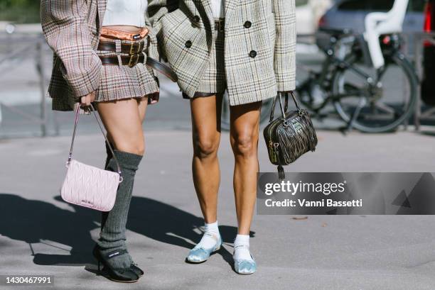 Maria Bernad and Tamu Mcpherson pose wearing Miu Miu after the Miu Miu show at the Palais de Iena during Paris Fashion Week - Womenswear...