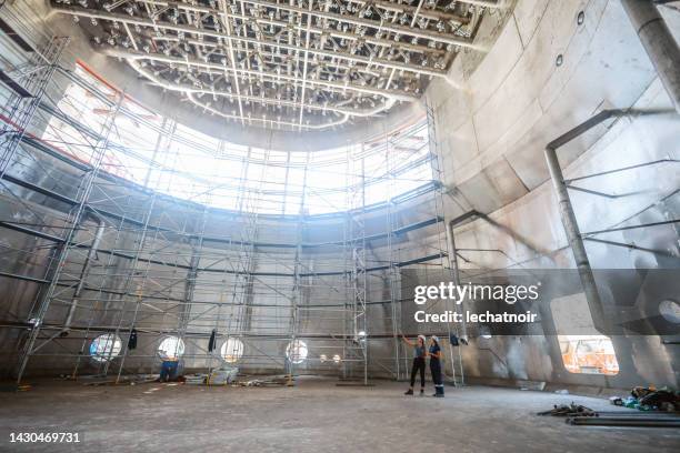 female engineers at the construction site - environmental damage stock pictures, royalty-free photos & images