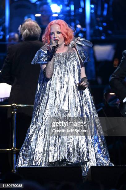 Members of Garbage, Steve Marker, Shirley Manson, Duke Erikson and Butch Vig perform on stage accompanied by The Royal Philharmonic Concert Orchestra...
