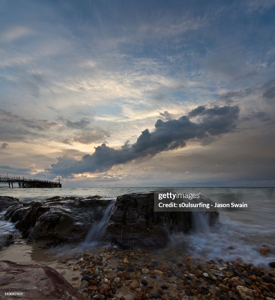 Waves crashing on rock