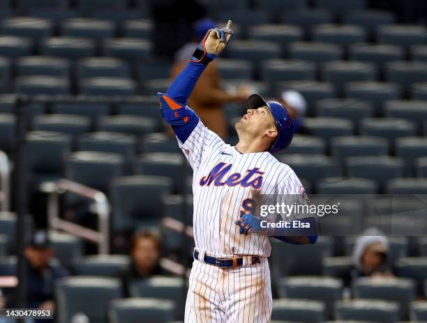 Brandon Nimmo of the New York Mets celebrates his solo home run in the fourth inning against the Washington Nationals during game one of a double...