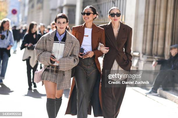 Alyssa Coscarelli and guests are seen outside the A.W.A.K.E. Mode show during Paris Fashion Week S/S 2023 on October 04, 2022 in Paris, France.