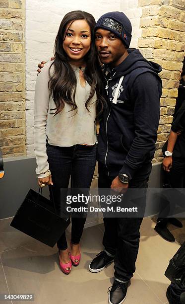 Dionne Bromfield and Ashley Walters attend the launch of Casio London's Global Concept Store in Covent Garden Piazza on April 18, 2012 in London,...