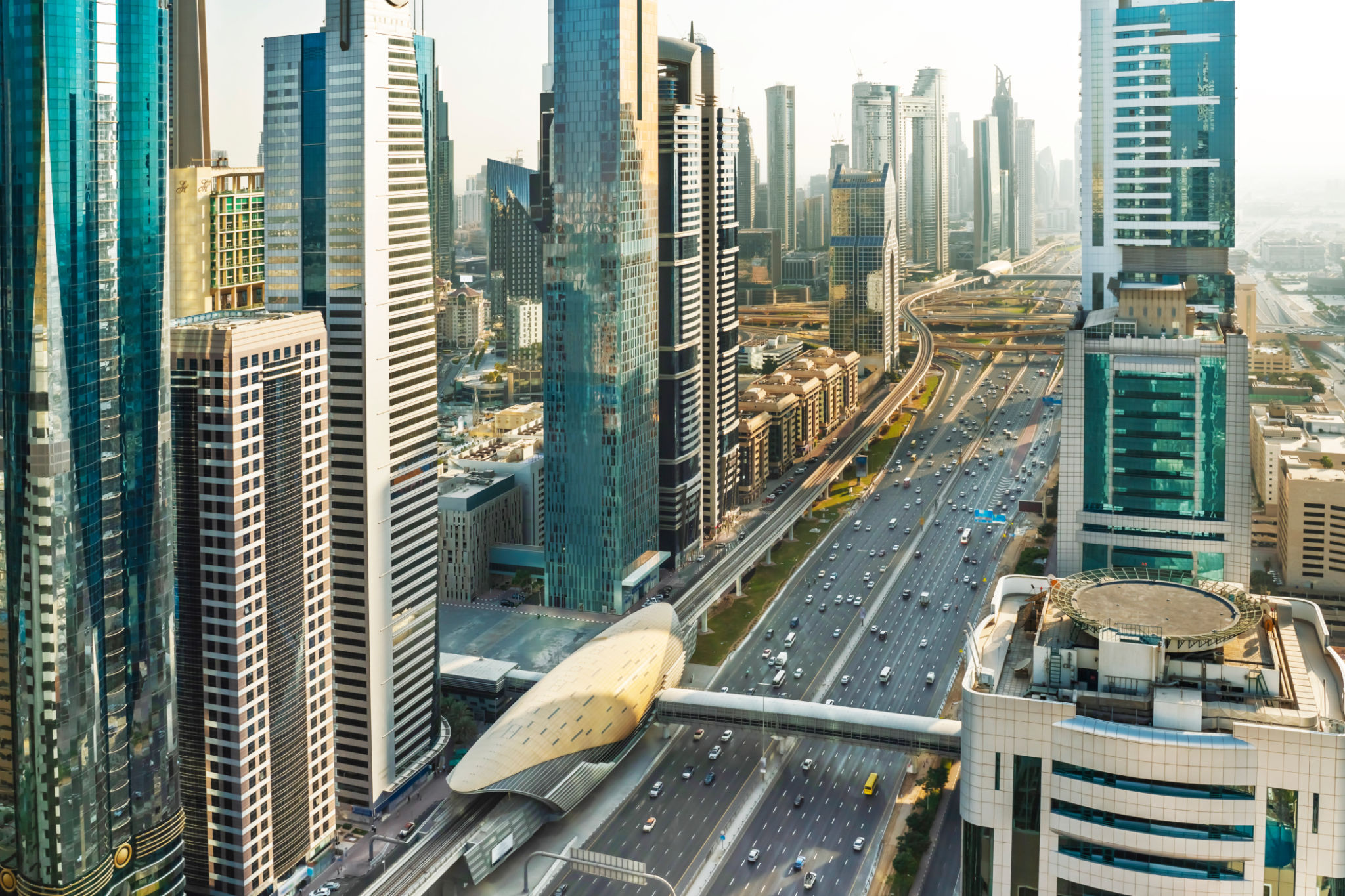 Aerial view of downtown Dubai. District DIFC (Dubai International Financial Center) is a federal financial-free zone located in the emirate of Dubai, United Arab Emirates. It is located on the Sheikh Zayed Road, not far from the Burj Khalifa. Aerial view of downtown Dubai. District DIFC (Dubai International Financial Center) is a federal financial-free zone located in the emirate of Dubai, United Arab Emirates. It is located on the Sheikh Zayed Road, not far from the Burj Khalifa.