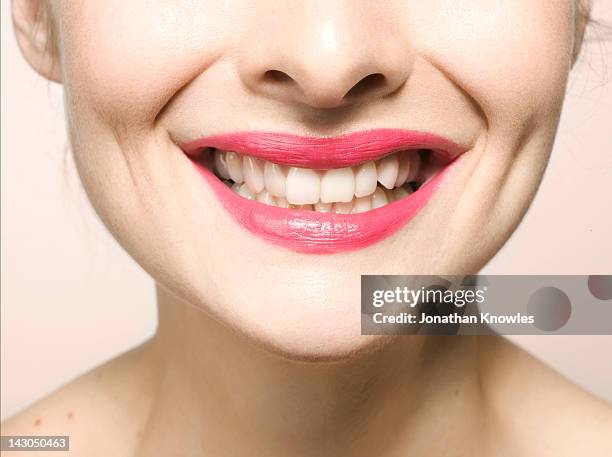 female smiling, close up on lips - cheesy grin stock pictures, royalty-free photos & images