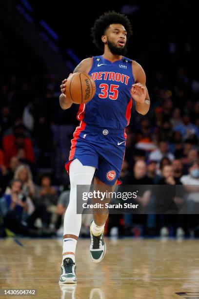 Marvin Bagley III of the Detroit Pistons dribbles during the first half against the New York Knicks at Madison Square Garden on October 04, 2022 in...