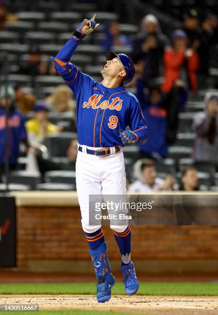 Brandon Nimmo of the New York Mets celebrates his solo home run in the first inning against the Washington Nationals during game two of a double...