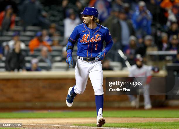 Jeff McNeil of the New York Mets reacts after he hit a solo home run in the first inning against the Washington Nationals during game two of a double...