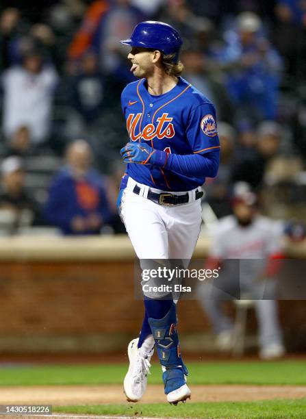 Jeff McNeil of the New York Mets reacts after he hit a solo home run in the first inning against the Washington Nationals during game two of a double...