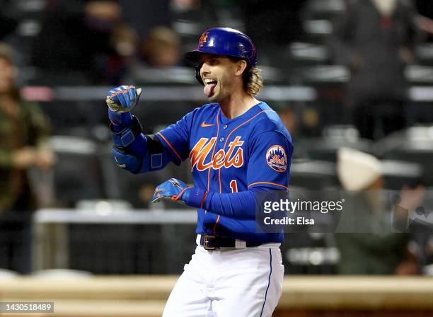Jeff McNeil of the New York Mets reacts after he hit a solo home run in the first inning against the Washington Nationals during game two of a double...