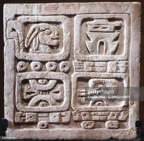 Four glyphs stone showing the systems of the Nahua and Zapotec calendars, artifact originating from Xochicalco . Xochicalco Civilization. Mexico...