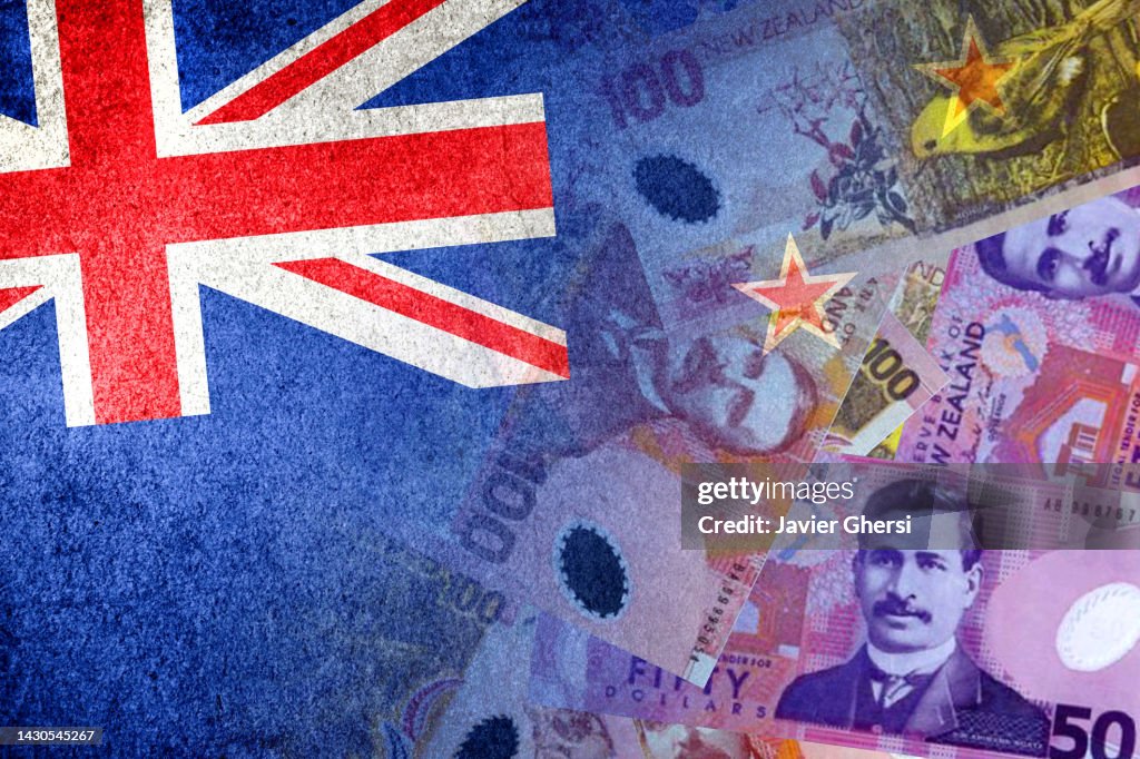 New Zealand flag and New Zealand dollar cash bills