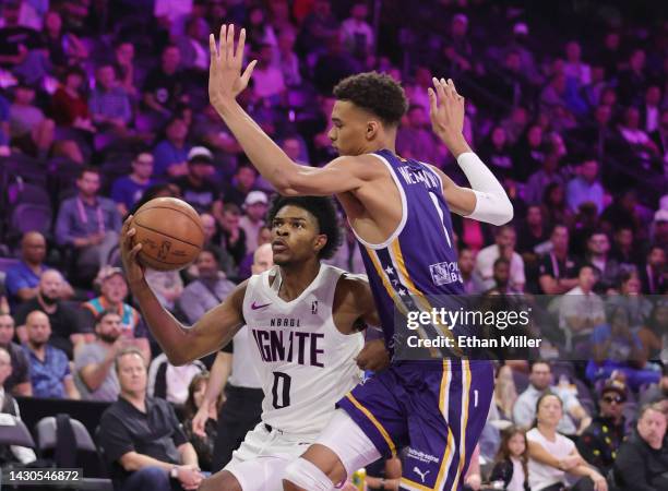 Scoot Henderson of G League Ignite drives to the basket against Victor Wembanyama of Boulogne-Levallois Metropolitans 92 in the second quarter of...