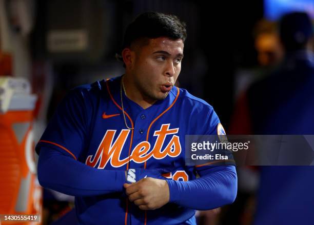 Francisco Alvarez of the New York Mets reacts in the dugout after hitting a home run in the sixth inning against the Washington Nationals during game...