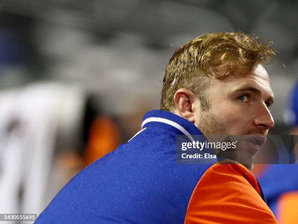 Pete Alonso of the New York Mets reacts after the Atlanta Braves clinched the division and the New York Mets are now the Wild Card team as he sits in...