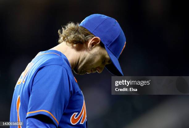 Jeff McNeil of the New York Mets reacts after the Atlanta Braves clinched the division and the New York Mets are now the Wild Card team as he sits in...