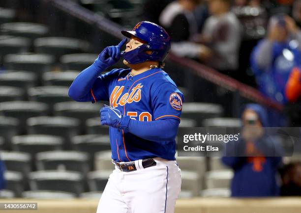 Francisco Alvarez of the New York Mets celebrates his solo home run in the sixth inning against the Washington Nationals during game two of a double...