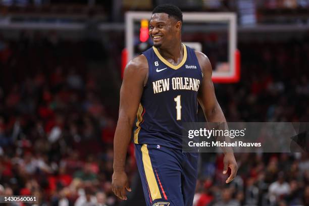 Zion Williamson of the New Orleans Pelicans laughs against the Chicago Bulls during the second half of a preseason game at the United Center on...