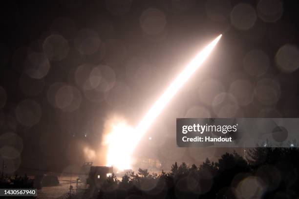 In this handout image released by the South Korean Defense Ministry, an Army Tactical Missile System is fired during a joint training between the...