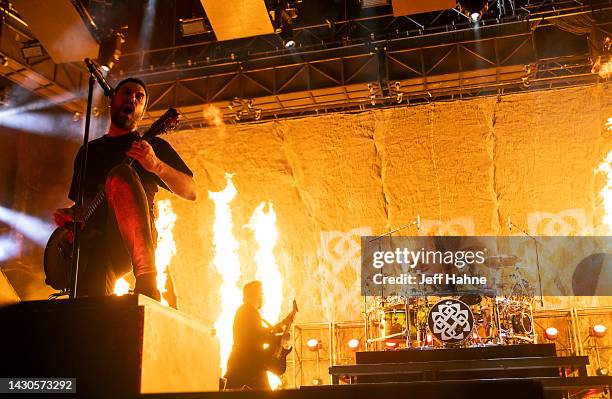 Singer/guitarist Benjamin Burnley and drummer Shaun Foist of Breaking Benjamin performs at PNC Music Pavilion on October 04, 2022 in Charlotte, North...