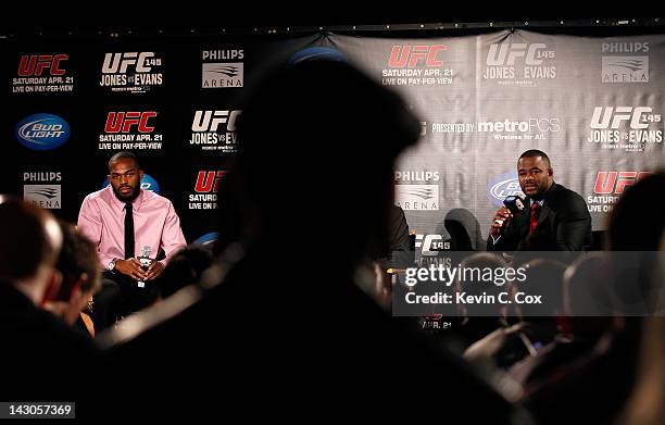 Jon Jones and Rashad Evans converse with the media during the press conference for the UFC 145 bout between Jones v Evans at Park Tavern on April 18,...