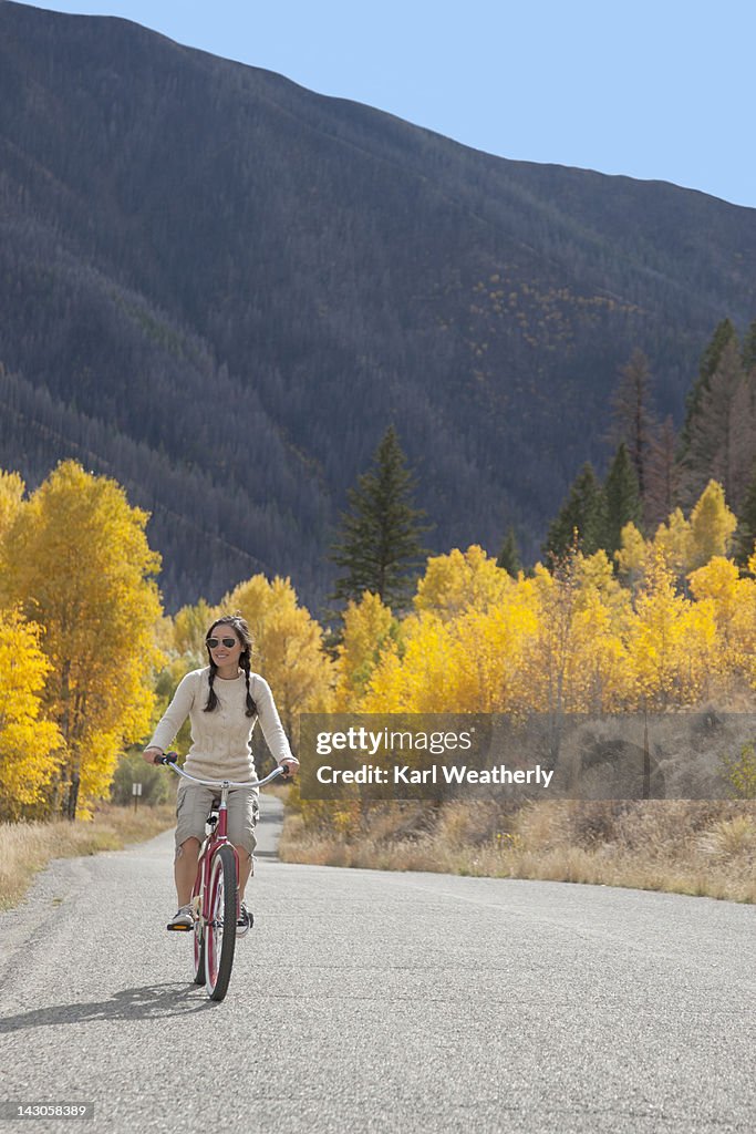 Woman riding on a cruiser bike