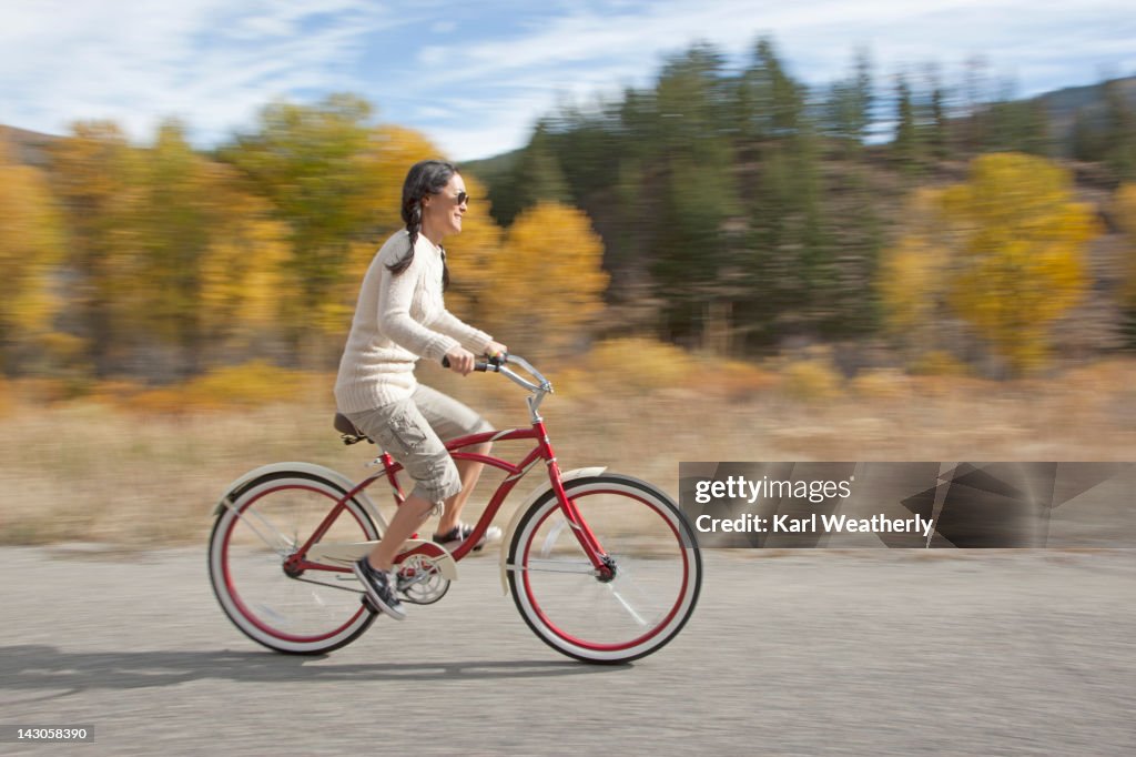 Woman riding on a cruiser bike