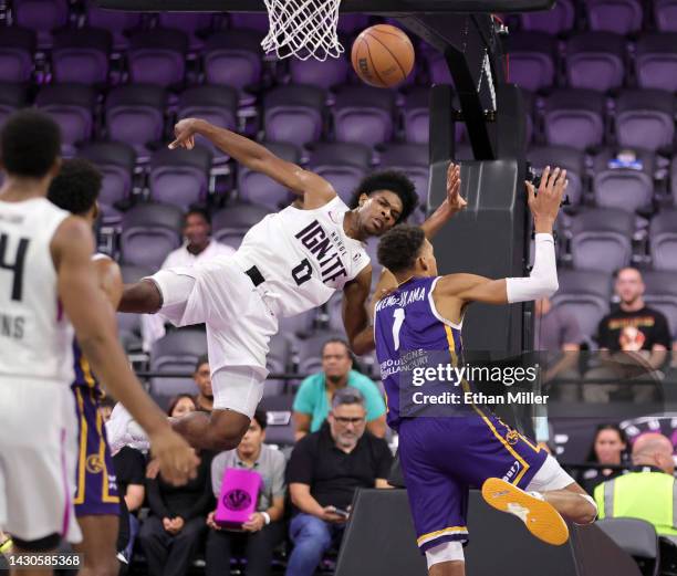 Victor Wembanyama of Boulogne-Levallois Metropolitans 92 blocks a shot by Scoot Henderson of G League Ignite in the fourth quarter of their...