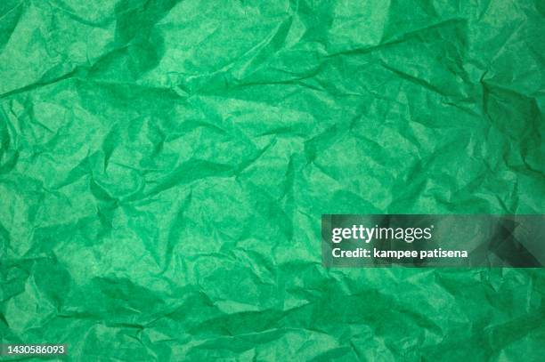 crumpled green paper or paper texture pattern background. abstract paper background. - torn gift stock pictures, royalty-free photos & images