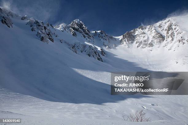 snowcapped mountain in senjojiki, nagano prefecture, honshu, japan - senjojiki cirque stock pictures, royalty-free photos & images