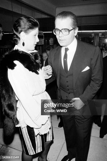 Diane de Beauvau-Craon and Karl Lagerfeld attend a party at Maxim's, a nightclub in Paris, France, on March 9, 1981.