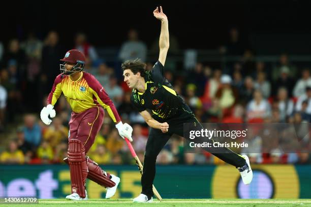 Pat Cummins of Australia bowls during game one of the T20 International series between Australia and the West Indies at Metricon Stadium on October...