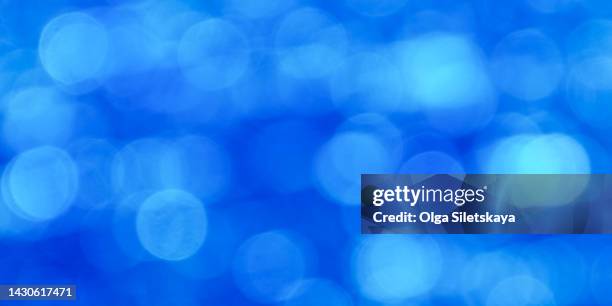 blue abstract background with defocused lights - spark creativity stock pictures, royalty-free photos & images