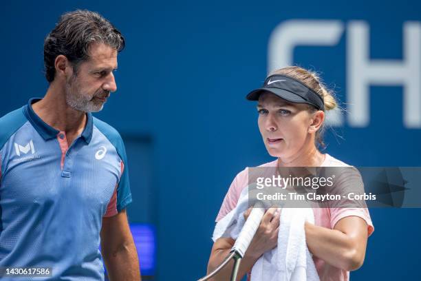 August 28. Simona Halep of Romania with coach Patrick Mouratoglou during a practice session in preparation for the US Open Tennis Championship 2022...