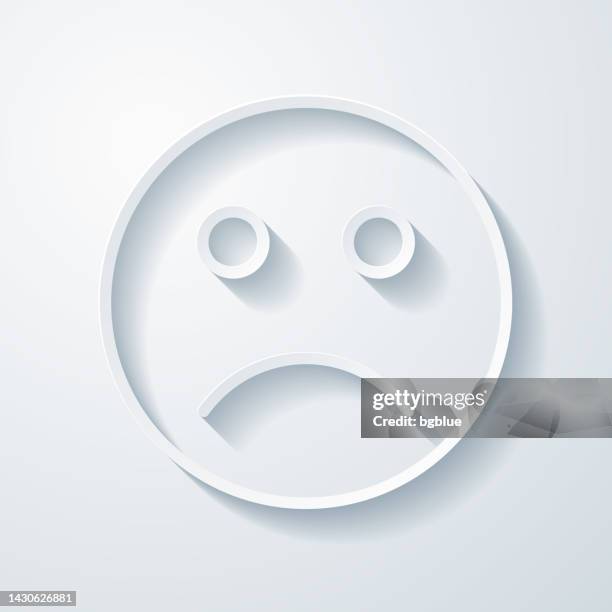 sad face emoji. icon with paper cut effect on blank background - sad face vector stock illustrations
