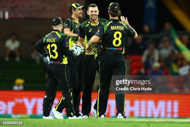 Josh Hazlewood of Australia celebrates after taking a catch during game one of the T20 International series between Australia and the West Indies at...