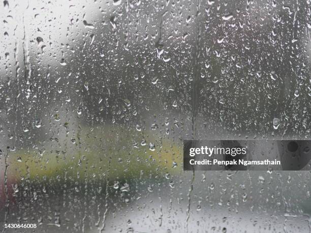 rain drops on the window - torrential rain stock pictures, royalty-free photos & images